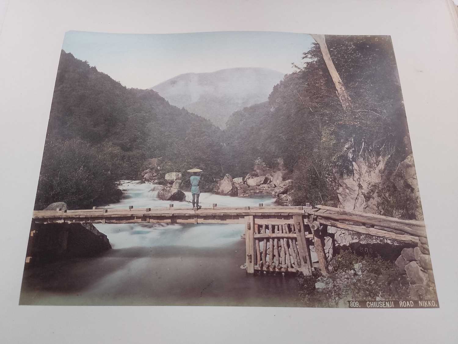 A Japanese hand coloured photo album with lacquer cover, Meiji period. - Image 26 of 52