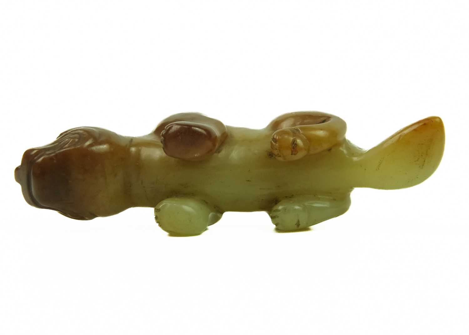 A Chinese russet jade tiger, Qing Dynasty, 19th century. - Image 5 of 25