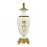 A porcelain and gilt metal oil lamp, late 19th century.