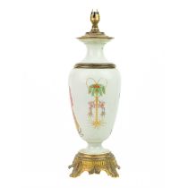 A porcelain and gilt metal oil lamp, late 19th century.
