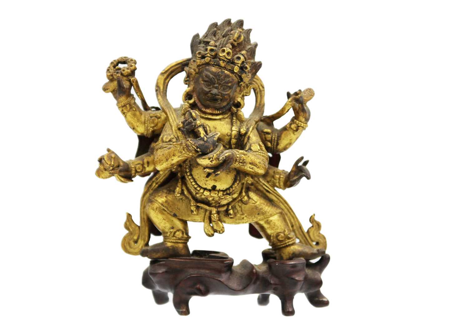 A Sino-Tibetan gilt bronze figure of Mahakala, 18th/19th century.