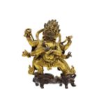 A Sino-Tibetan gilt bronze figure of Mahakala, 18th/19th century.