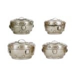 A Chinese silver set of four graduated circular boxes.