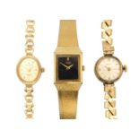 Three lady's wristwatches including a Sovereign 9ct bracelet quartz.