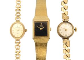 Three lady's wristwatches including a Sovereign 9ct bracelet quartz.