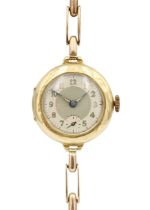 An early 20th century 18ct lady's manual wind wristwatch with 15ct expanding bracelet.