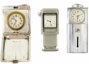 A selection of three purse watches.