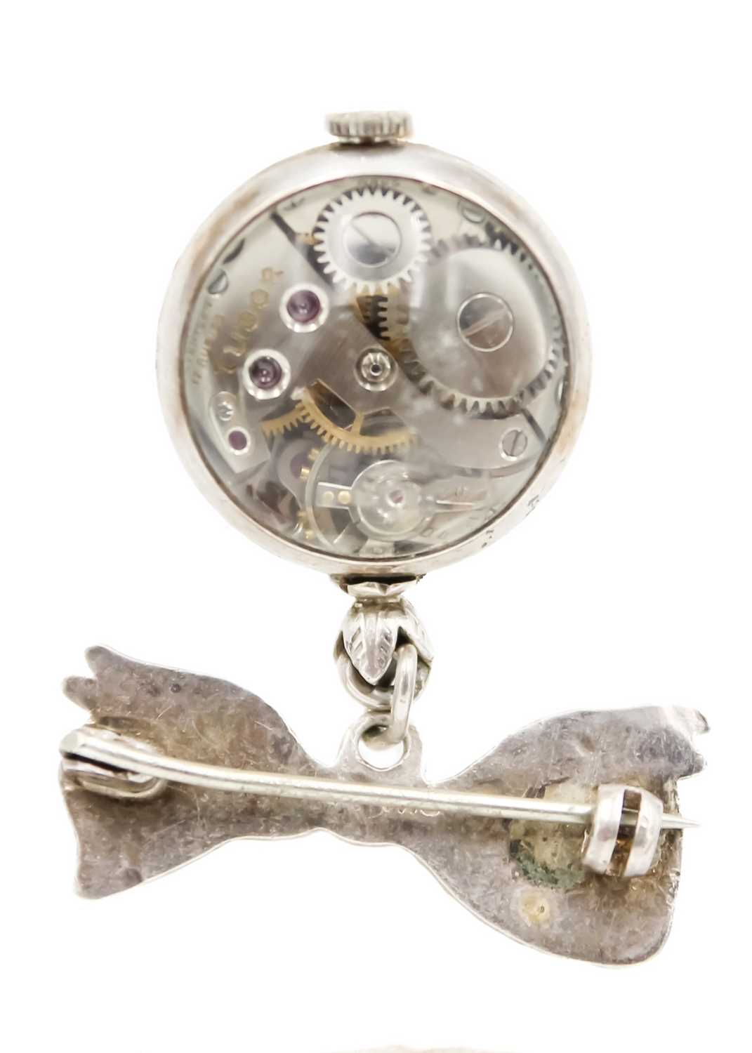 A Tudor silver nurses 'ball' watch on a silver ribbon brooch and a 935 silver enamel fob watch. - Image 5 of 6