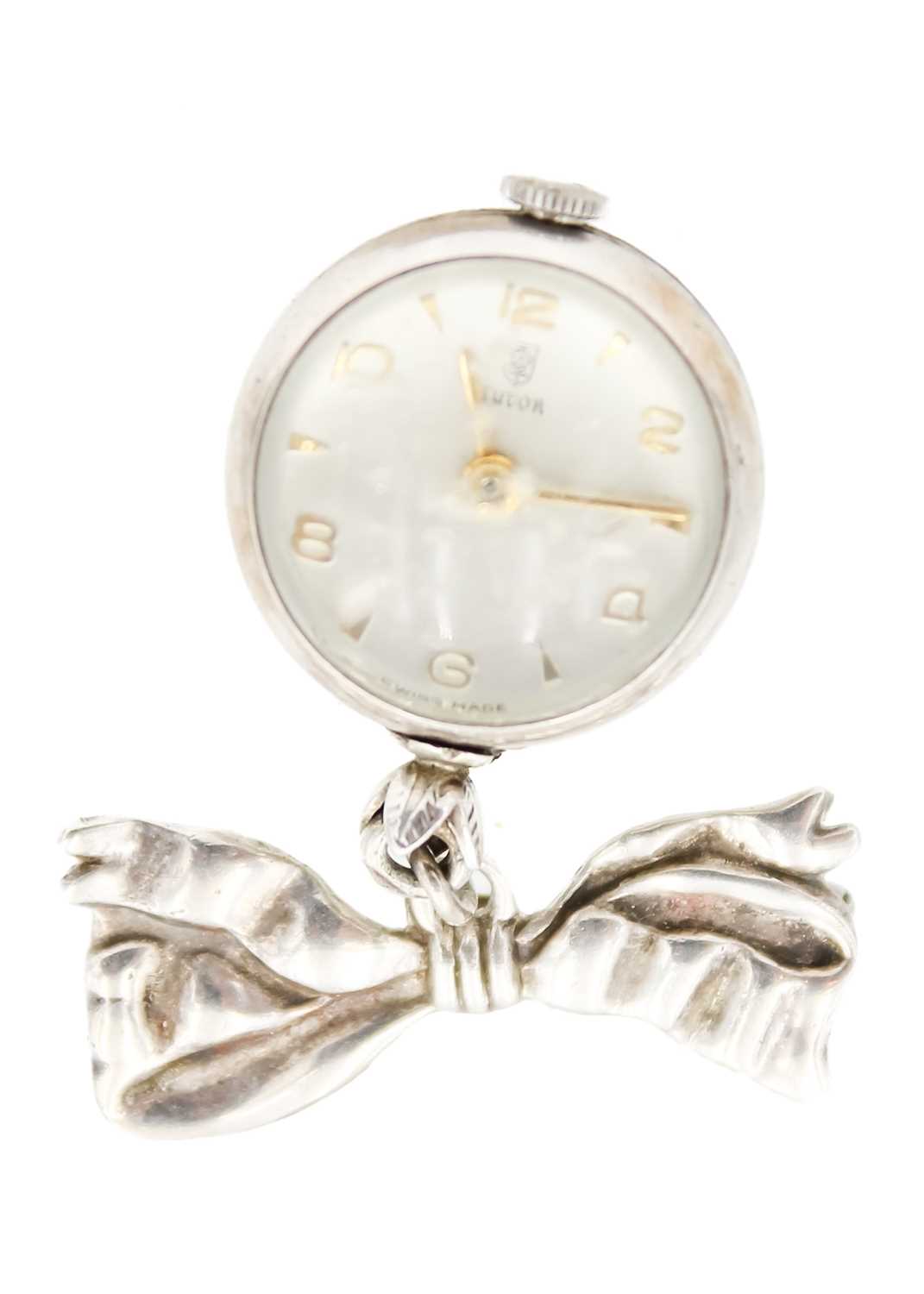 A Tudor silver nurses 'ball' watch on a silver ribbon brooch and a 935 silver enamel fob watch. - Image 3 of 6