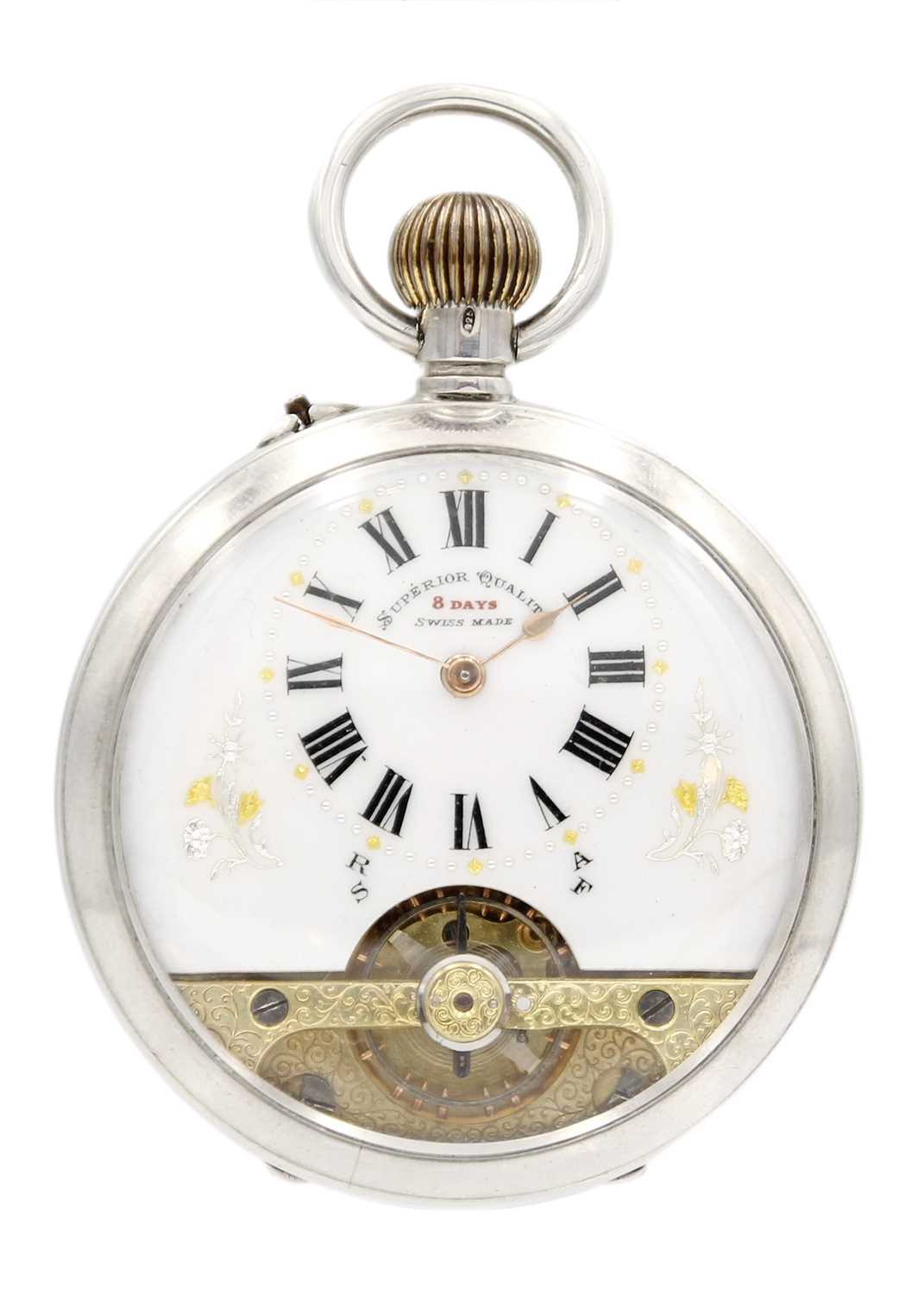 A silver cased crown wind pocket watch with visible escapement dial.