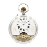 A silver cased crown wind pocket watch with visible escapement dial.
