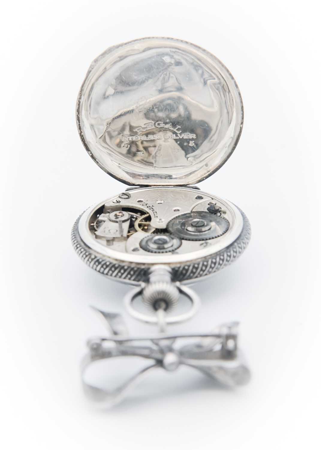 OMEGA - A silver cased crown wind fob pocket watch on silver bow brooch. - Image 3 of 4