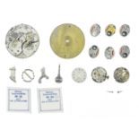 A collection of watch makers parts, spares and movements.