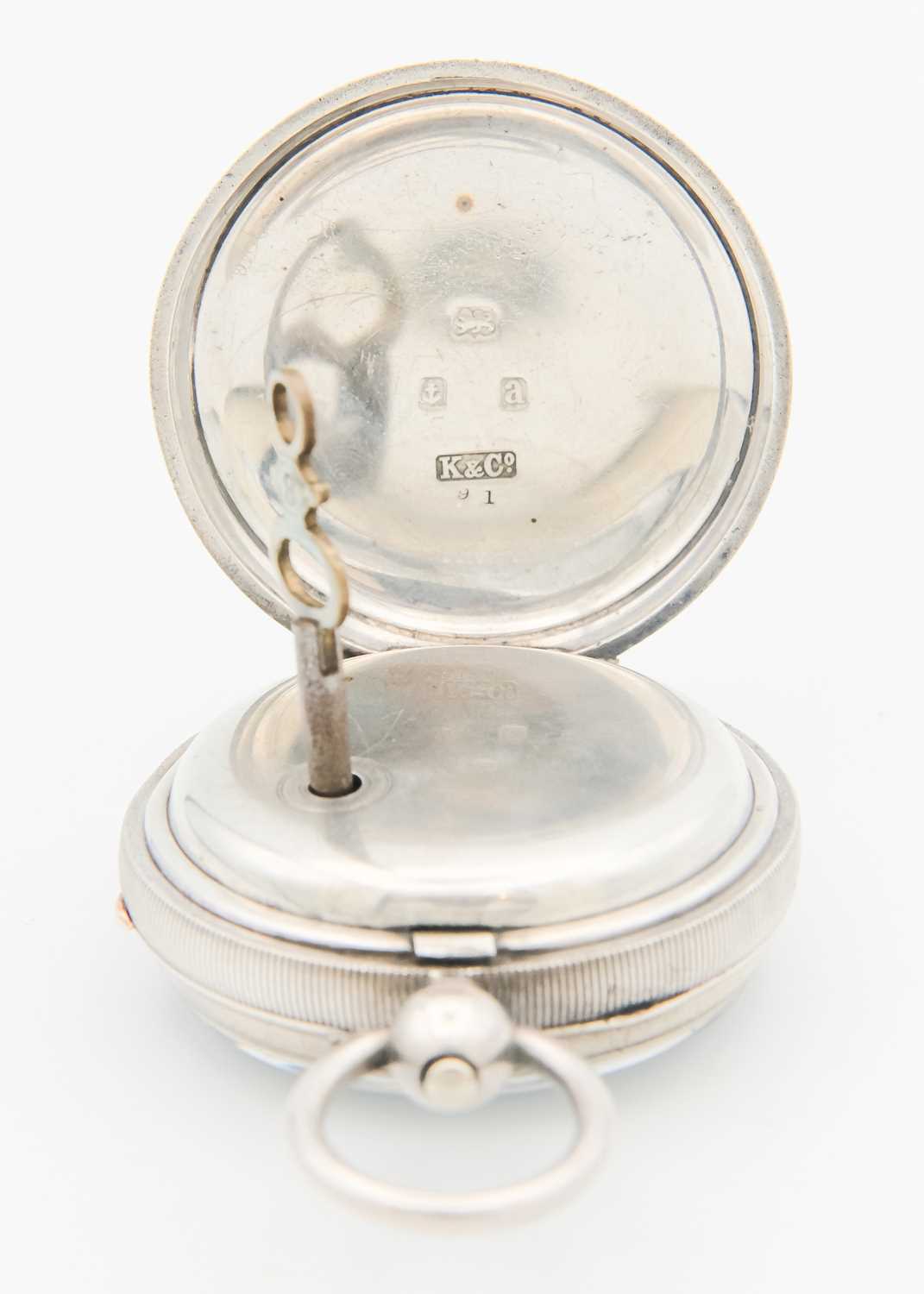 A silver key wind open face lever pocket watch. - Image 3 of 5