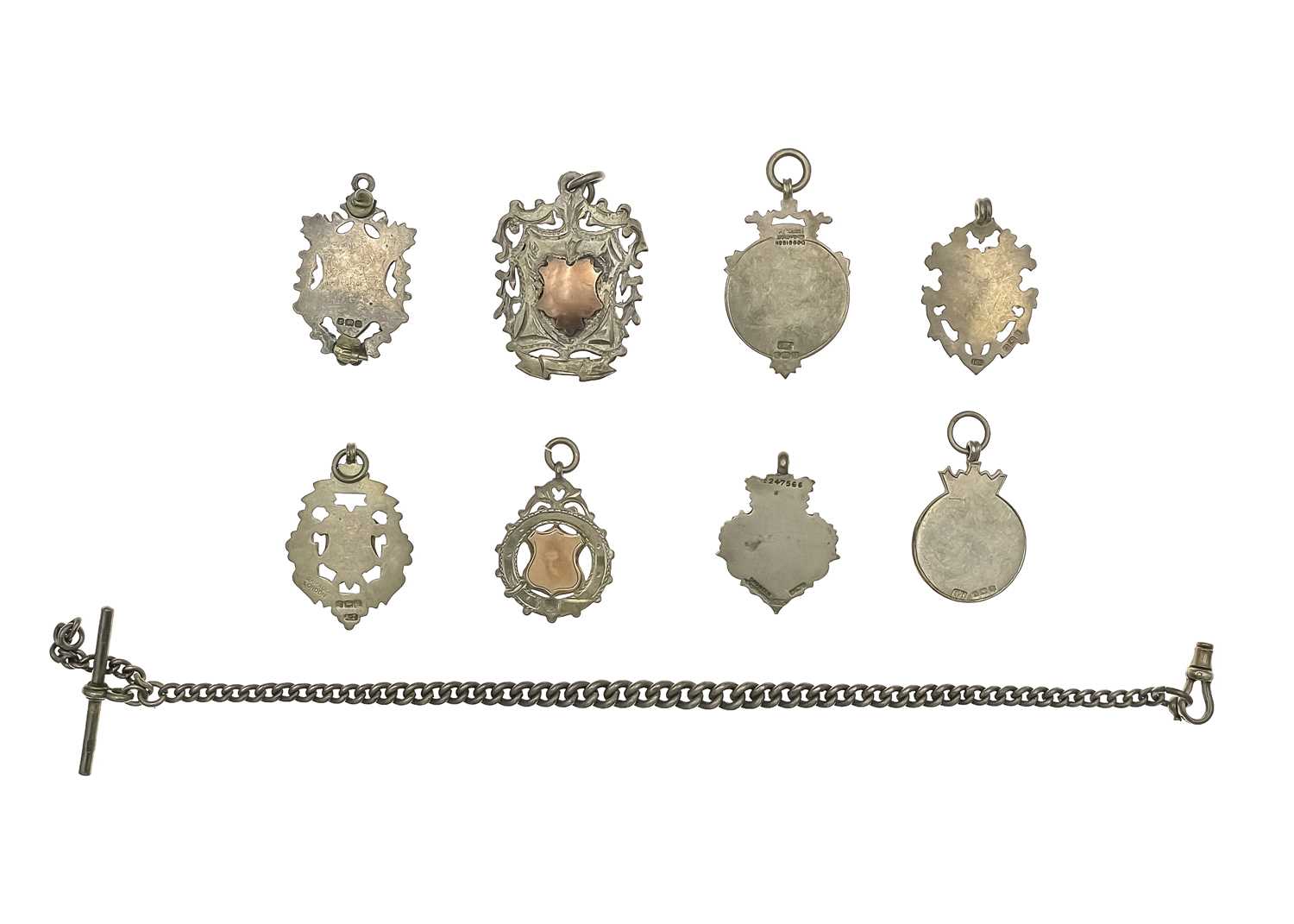 A selection of eight silver shield watch fobs and a silver Albert watch chain. - Image 2 of 2