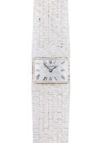 BUECHE-GIROD - A 9ct white gold lady's manual wind bracelet wristwatch.