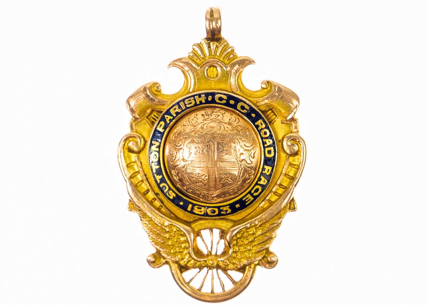 An Edwardian 15ct rose gold shield watch chain fob.
