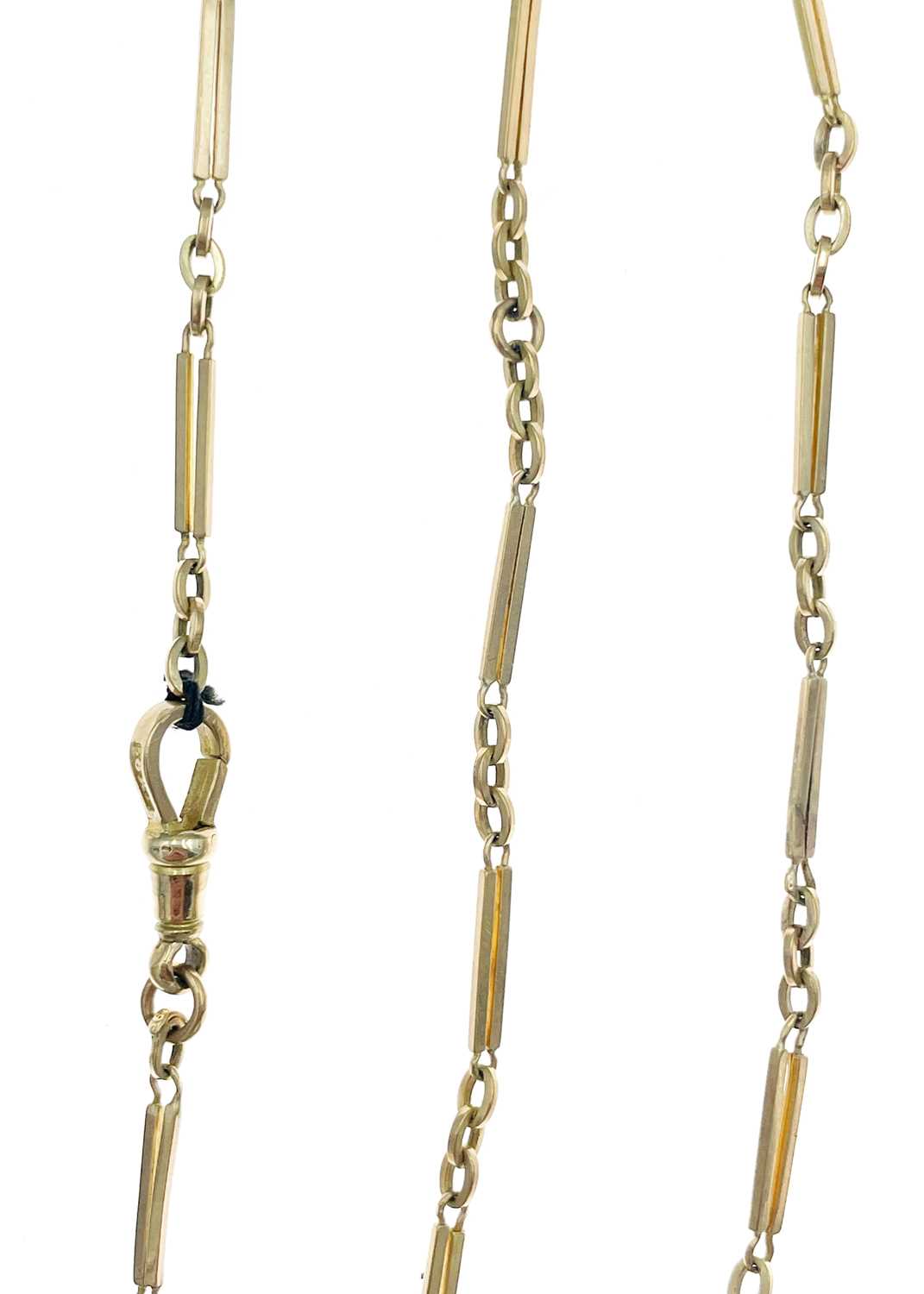 A 9ct gold slender Albert pocket watch chain. - Image 2 of 2