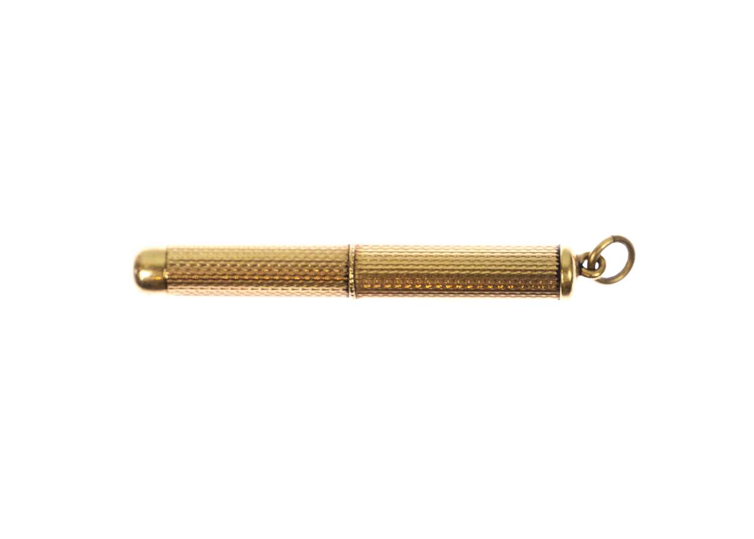 ASPREY & CO - A 9ct engine turned propelling toothpick fob. - Image 2 of 2