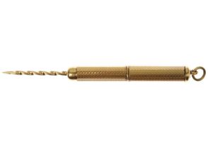 ASPREY & CO - A 9ct engine turned propelling toothpick fob.