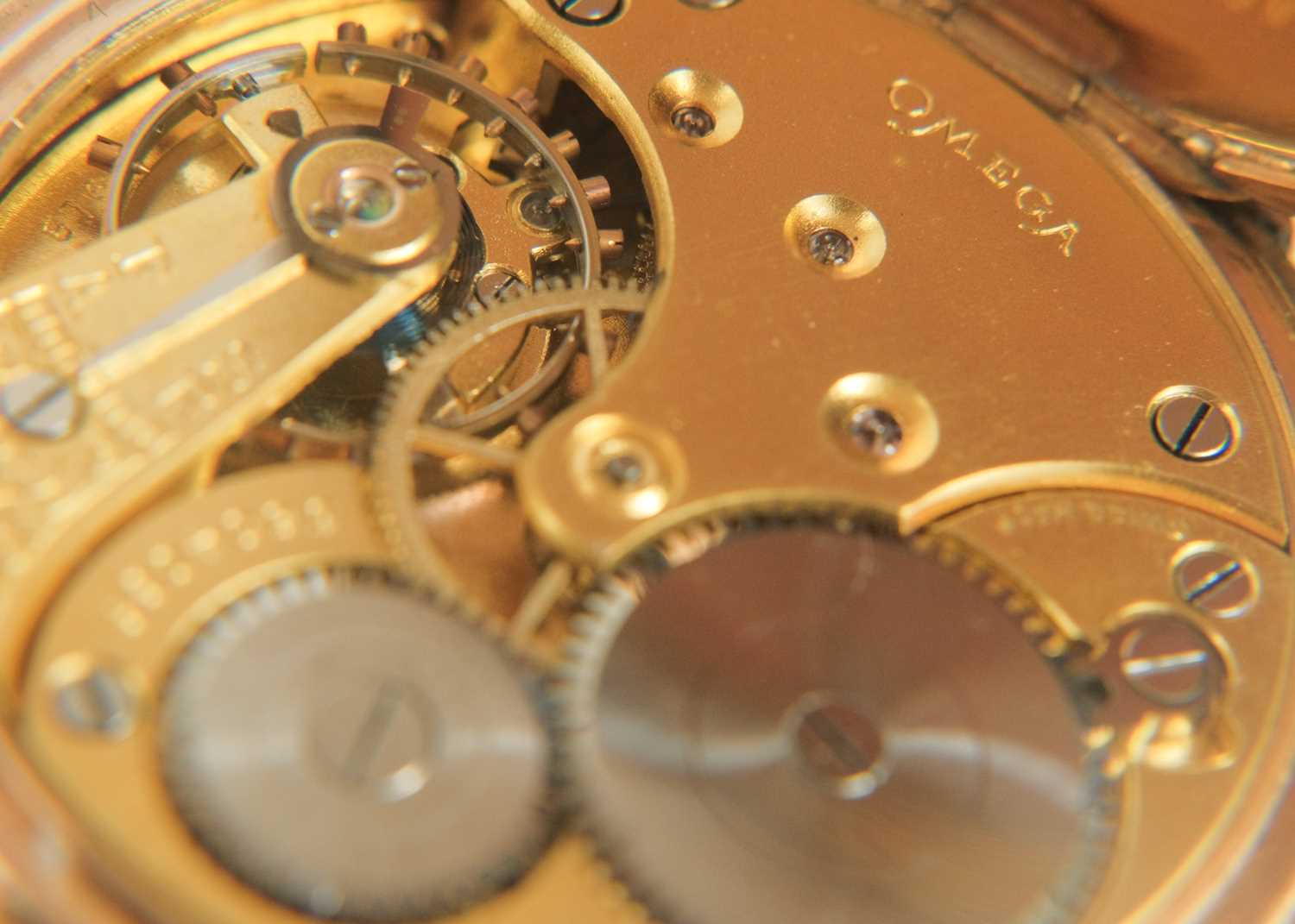 OMEGA - A gold-plated open face crown wind lever pocket watch. - Image 7 of 7