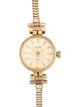 ENICAR - An Incabloc 25 lady's 18ct cased manual wind wristwatch with 9ct gold bracelet.