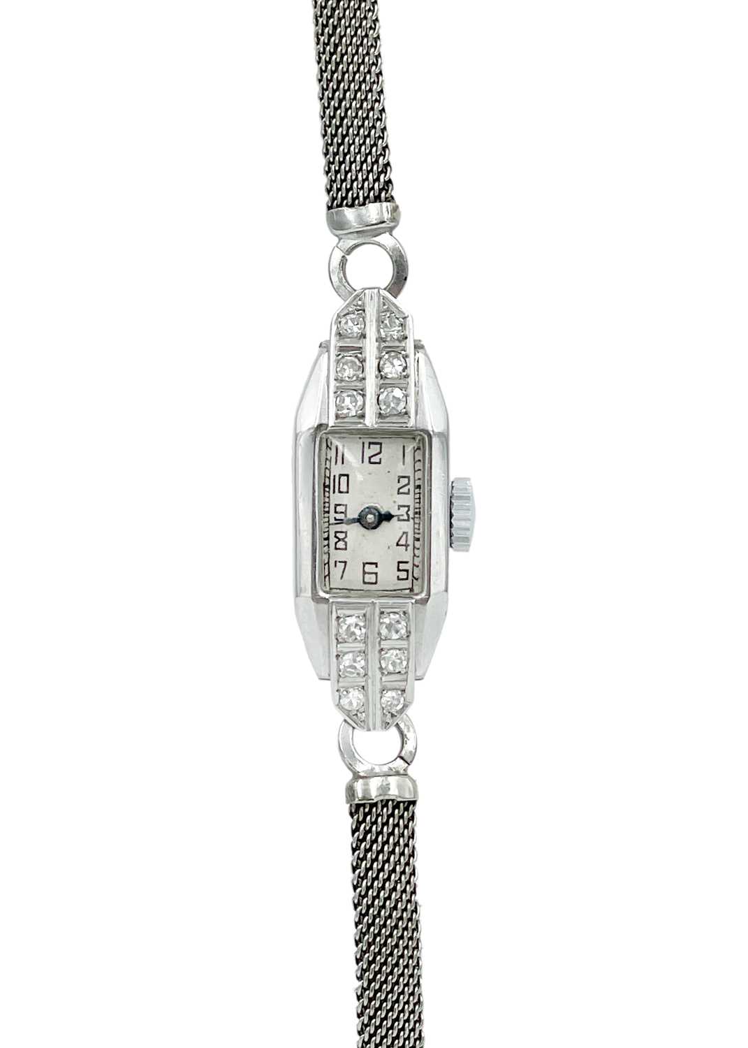 An Art Deco platinum cased, diamond set, lady's manual wind cocktail watch.