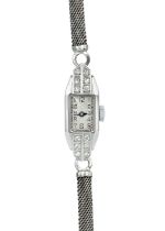 An Art Deco platinum cased, diamond set, lady's manual wind cocktail watch.