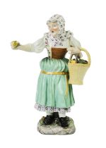A late 19th century Meissen porcelain figure of an apple seller.