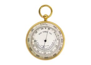 A late 19th century gilt brass pocket aneroid barometer.