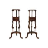 A pair of mahogany gentleman's tripod washstands.