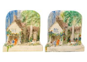 A pair of Clarice Cliff cottage bookends shape 411.