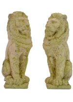 Two reconstituted stone figures of seated lions.