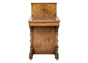 A Victorian burr walnut and boxwood strung Davenport desk.