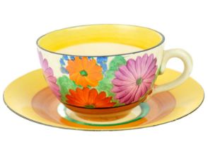 A Clarice Cliff Gay Day pattern tea cup and saucer.
