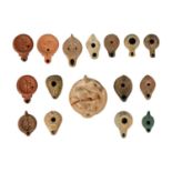 A collection of terracotta oil lamps
