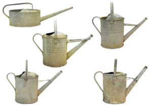 A two gallon galvanised watering can.