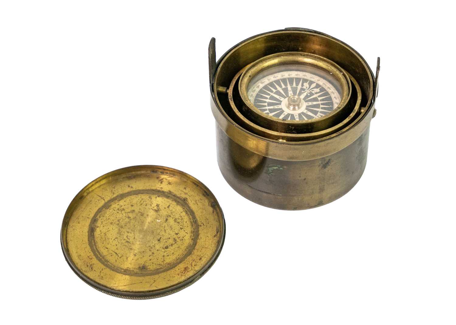 A 19th century brass gimbal mounted pocket compass.