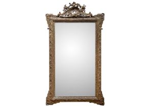 A gilt plaster wall mirror.