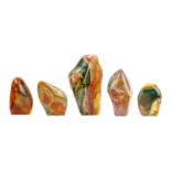 Five polychrome jasper mineral specimens.