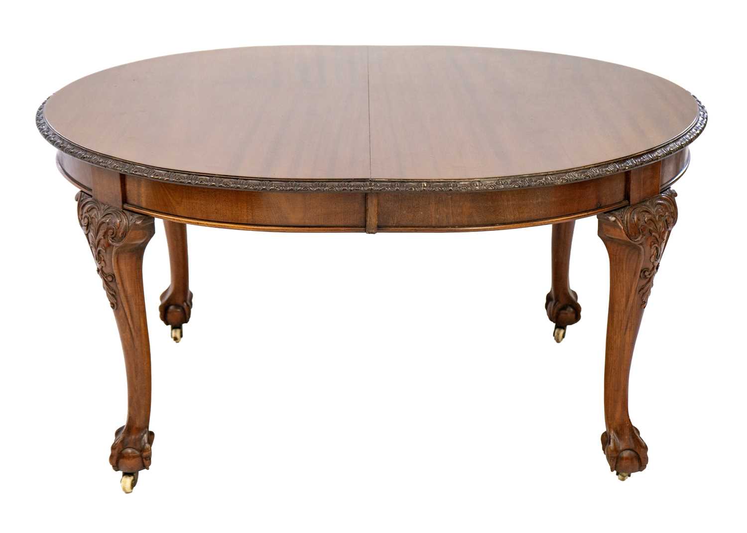 A Victorian mahogany extending dining table. - Image 4 of 7