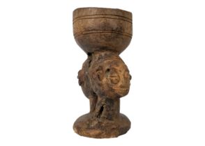 An African carved libation cup possibly Kuba