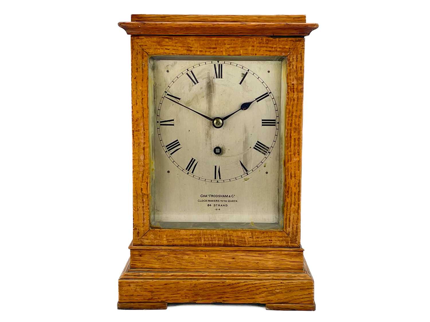 A Charles Frodsham oak four-glass library timepiece.