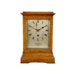 A Charles Frodsham oak four-glass library timepiece.