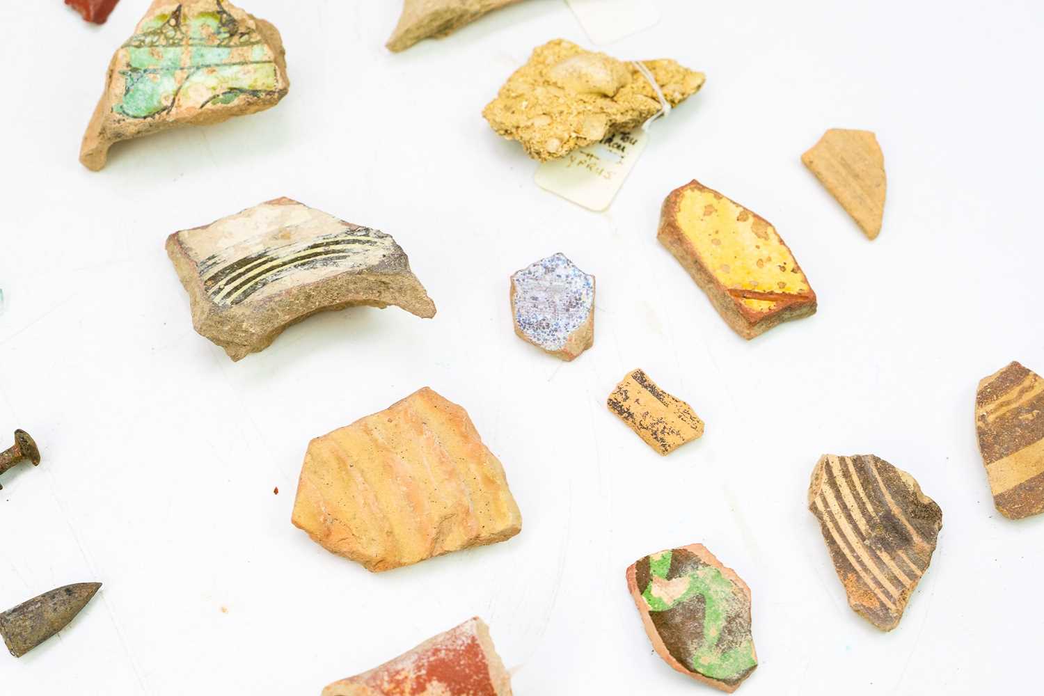A group of Cypriot pottery shards and glass fragments. - Image 2 of 3