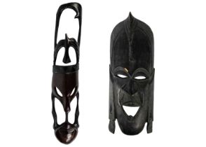A large African wood carved mask.