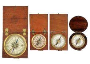 A 19th century travel compass with printed card dial in a square oak case.