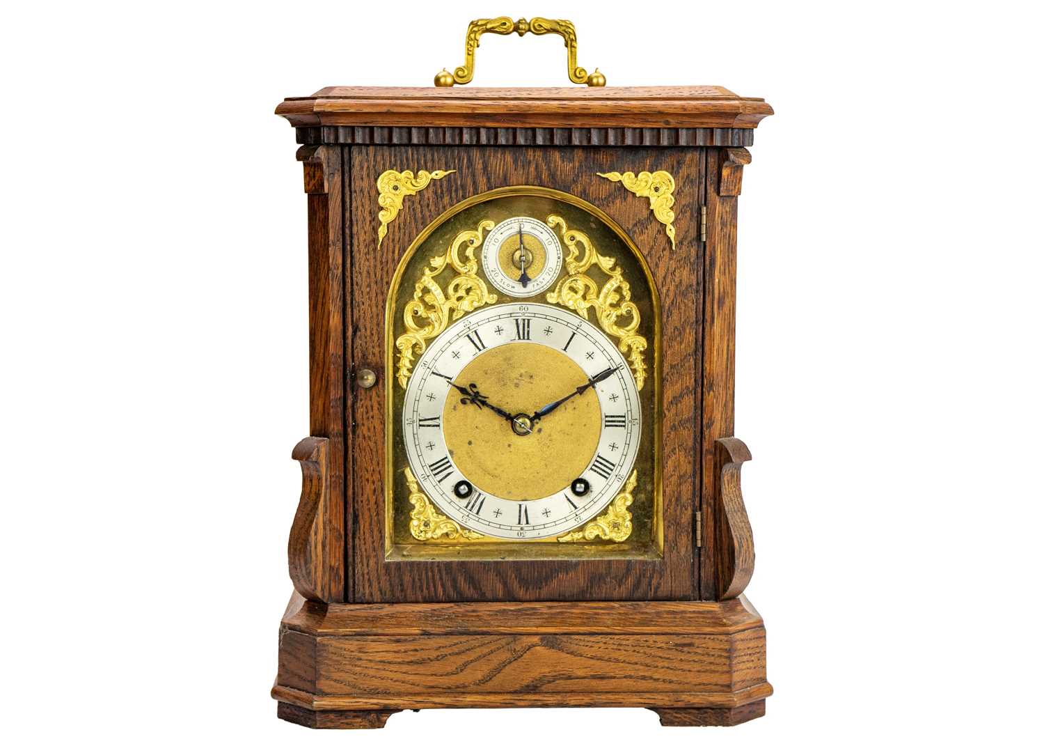 A German Winterhalder and Hofmeier oak cased chiming bracket clock.