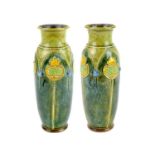 A pair of Royal Doulton stoneware vases.