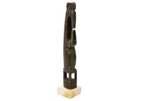 A finely carved Oceania figure.